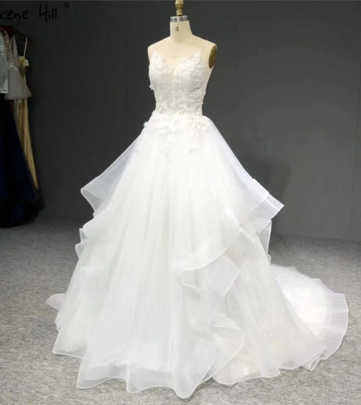Abiti da sposa bianchi fatti a mano con paillettes di fiori senza maniche semplici abiti da sposa fotografici Ha2327 Matrimonio