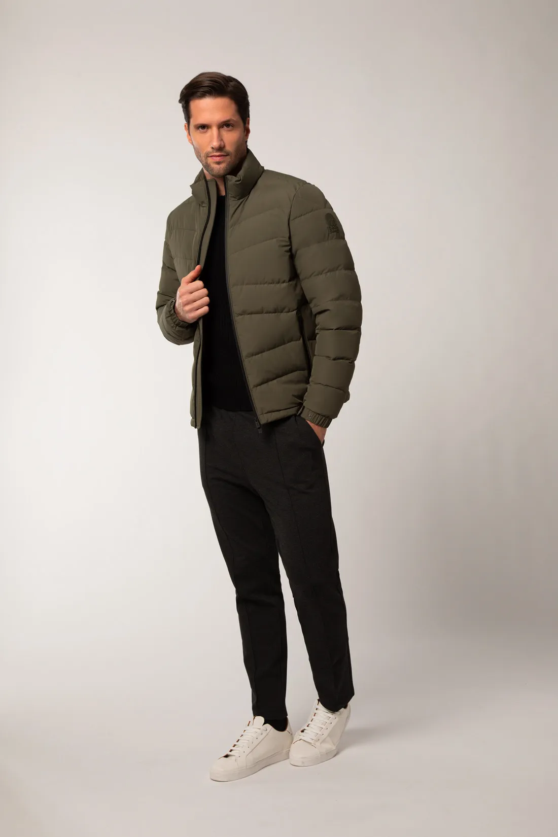 AKRON – Piumino verde full zip con filze a zig zag