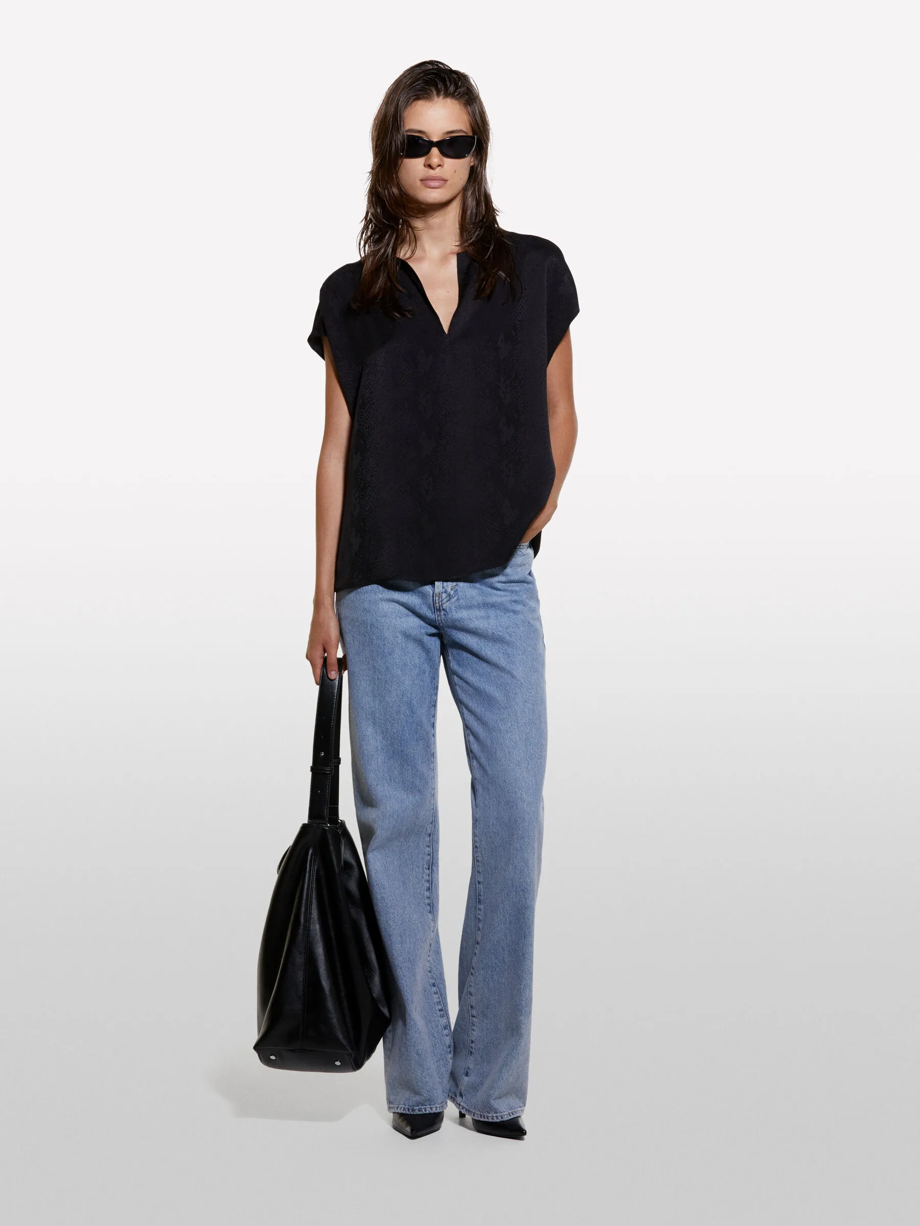 Blusa jacquard nera