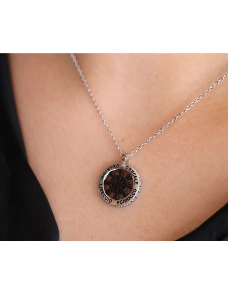 collana uomo acciaio ciondolo tondo timone e venti nero zirconi bianchi