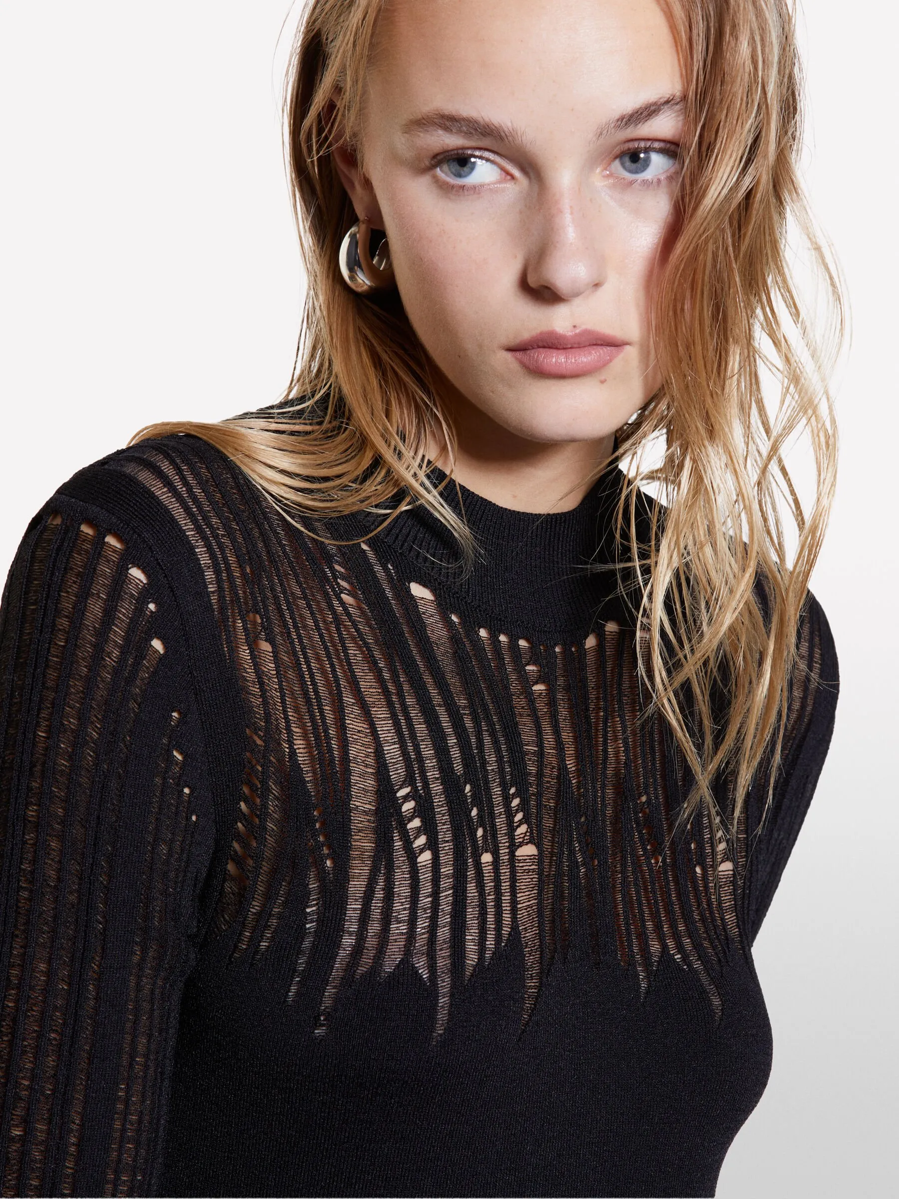 Nuovi arrivi      Vestito nero lungo in maglia