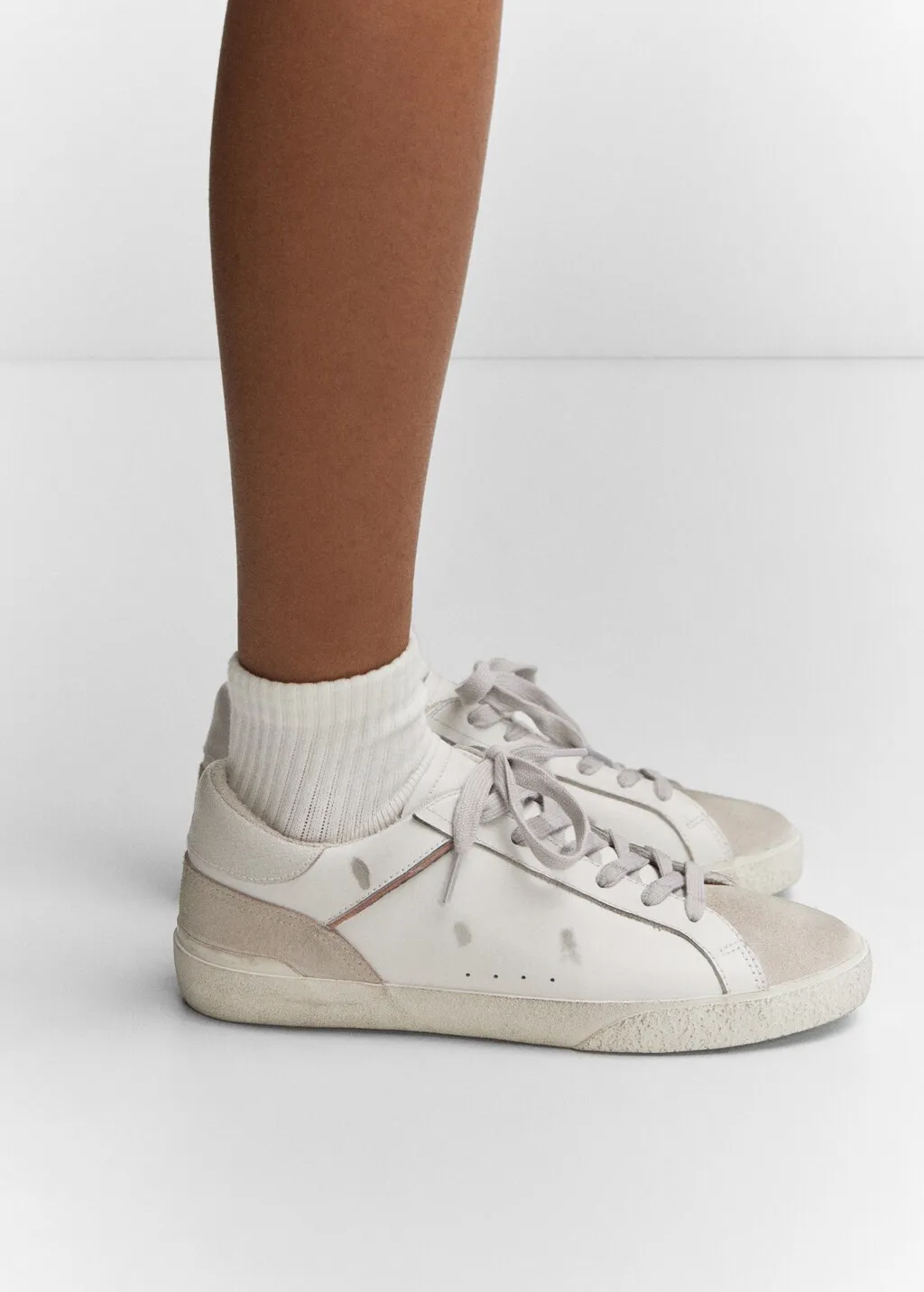 Sneaker pelle effetto consumato