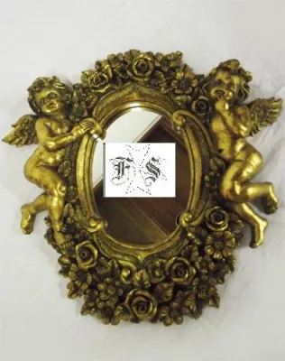 SPECCHIO GRANDE OVALE CON PUTTI