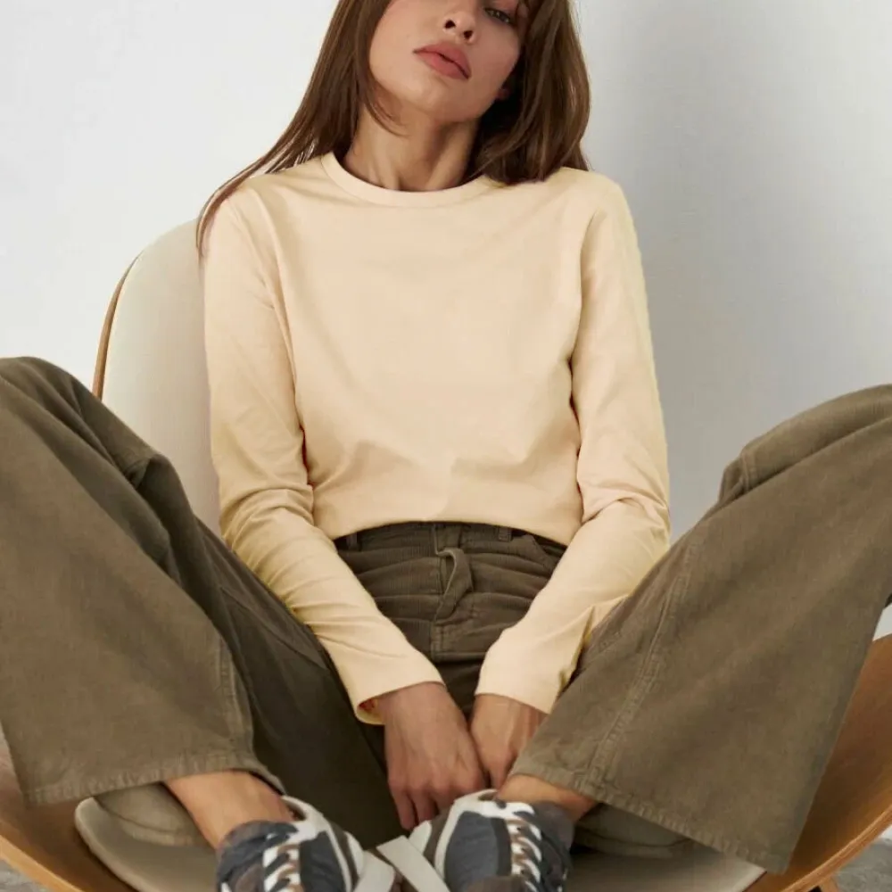 T-shirt in puro cotone Europa e America 2024 Primavera Nuove donne Moda Resto Versatile Pendolarismo Pullover Girocollo Lon